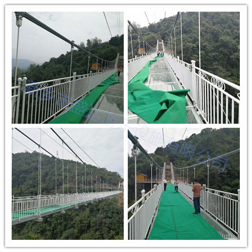 宜昌三峡九凤谷景区玻璃天桥抗风索架设中，即将炫丽登场，盛达索桥--专业智造！